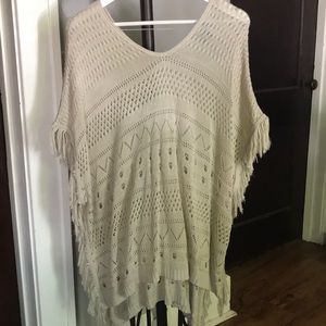 Bohemian style top with sleeves.